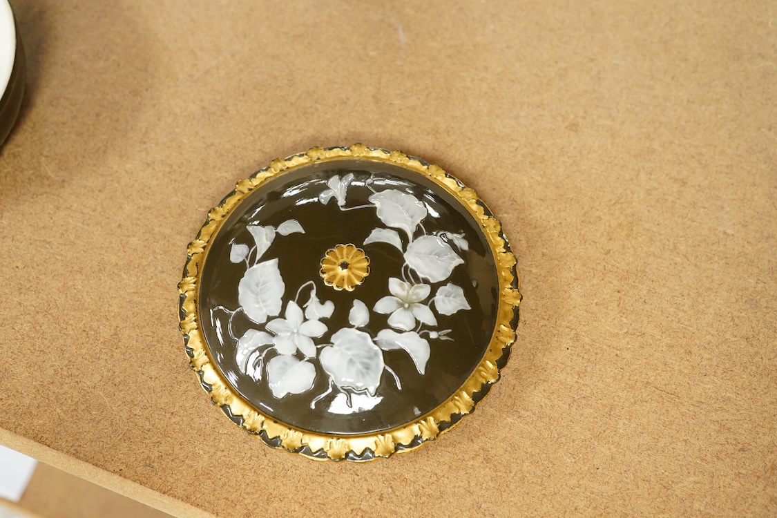 An English circular floral pate-sur-pate box and cover, 11.5cm